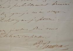 Le peintre Philippe Rousseau fait vernir l'un de ses tableaux avant son exposition.